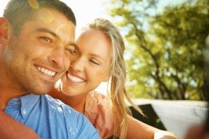 Couple Embracing Under the Sunlight