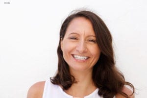 Brunette Model Smiling on White Background