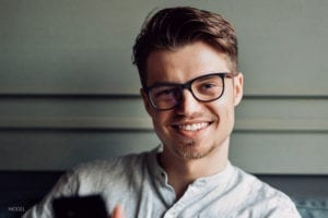 Young Male With Glasses Smiling