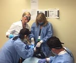Dr. Beck Performing Surgery with Team