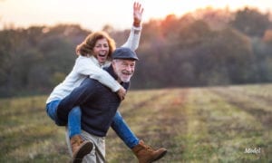 Mature Couple Having Fun in A Field