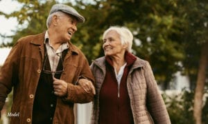 Mature couple holding hands and looking at each other