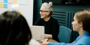 Woman smiling during a meeting